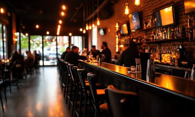 Dimly lit speakeasystyle bar with vintage decor, moody lighting, and patrons enjoying cocktails in a retro ambiance, every detail finely crafted, high resolution 8K